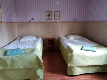 Фото номера Двухместный номер с 2 отдельными кроватями и собственной ванной комнатой Кемпинги Patruunantalo г. Vatmusa 23